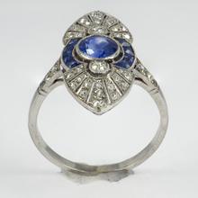 Vintage French Sapphire, Diamond and Platinum Cocktail Ring; set with 1.25cts sapphires and 0.80cts old European-cut diamonds, maker’s mark for Jean Jorens
