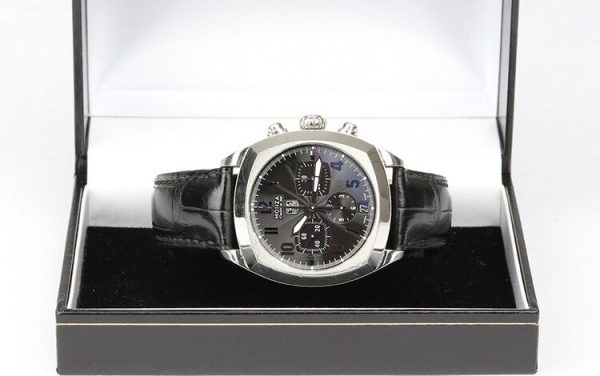 Tag Heuer Monza 38mm Steel Automatic Chronograph; Ref. CR5110, black dial with Arabic numerals, calibre 36 movement visible through the display back, on a TAG Heuer black leather strap with stainless steel push-button deployment buckle.