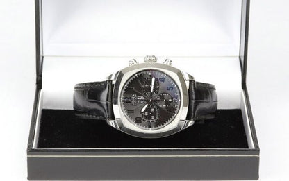 Tag Heuer Monza 38mm Steel Automatic Chronograph; Ref. CR5110, black dial with Arabic numerals, calibre 36 movement visible through the display back, on a TAG Heuer black leather strap with stainless steel push-button deployment buckle.