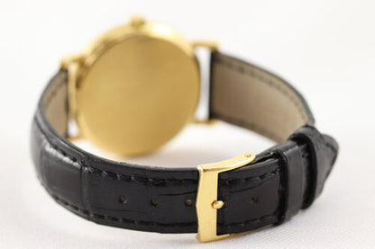 Patek Philippe 3802 Calatrava 18ct Yellow Gold 33mm Automatic, porcelain white dial, Roman numerals, date indicator at 3, calibre 310SC, Patek Phillipe black leather strap with 18ct Yellow Gold buckle, Circa 1991, in mint condition, with Patek Philippe pouch and papers.