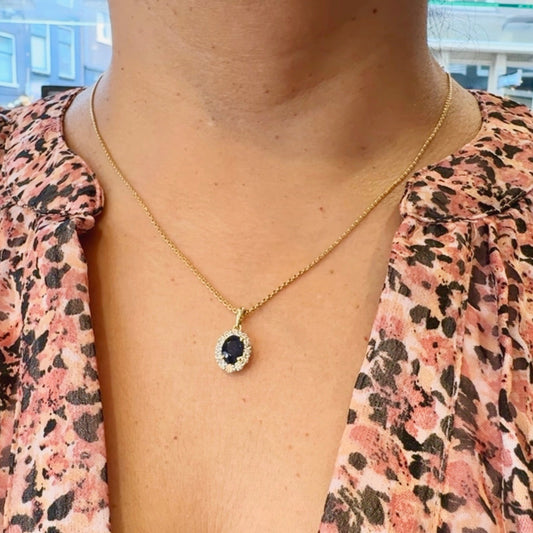 14 Carat Yellow and White Gold Sapphire 0.90 Carat and Diamond 0.35 Carat Oval Cluster Pendant