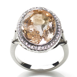 Peach sapphire and Diamond Cluster Ring