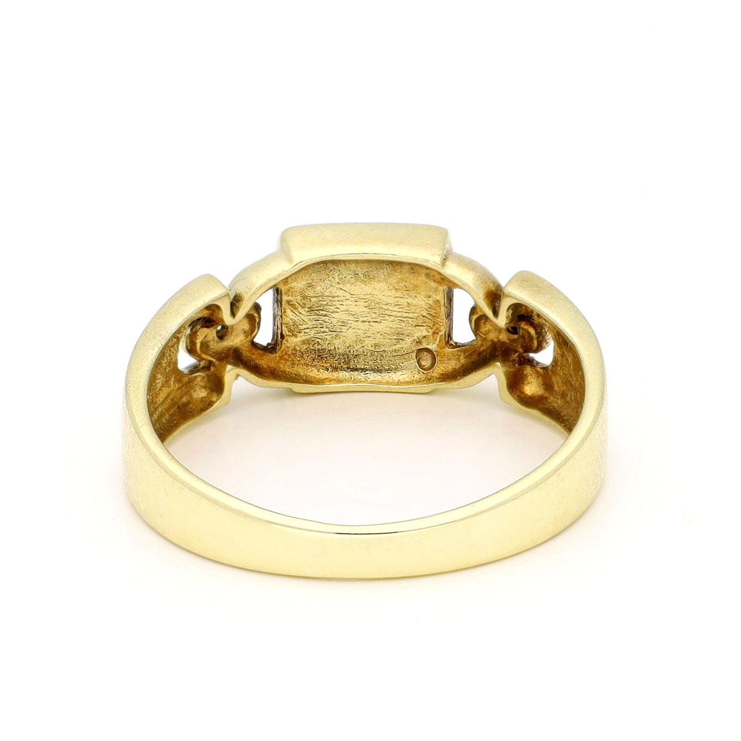 A yellow gold ring, against a white background