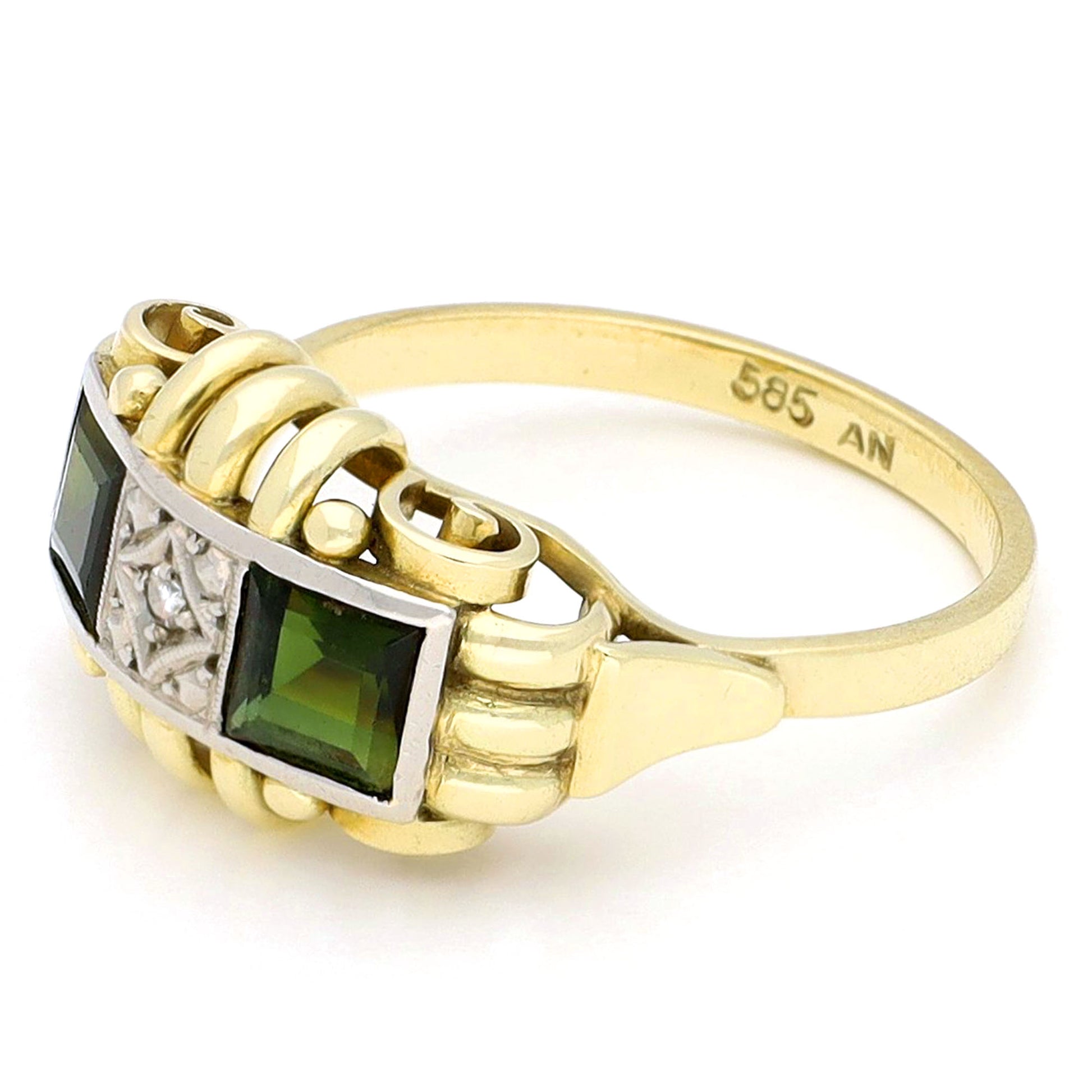 Square green tourmaline and round diamond ring in yellow and white gold, stamped 585, against a white background