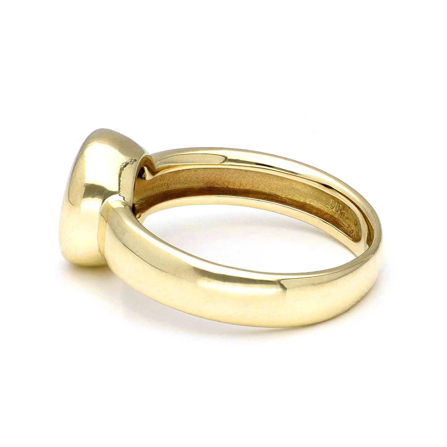 Yellow gold ring, against a white background