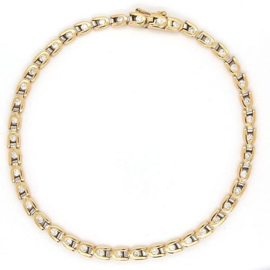 Contemporary 1.20ct Diamond Line Bracelet in 18ct Yellow Gold; set with 42 round brilliant-cut diamond totalling 1.20 carats, secured by a tongue and groove clasp with figure-of-eight safety catch