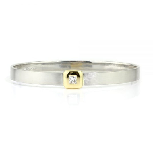 Platinum Bangle Bracelet with Princess Cut Diamond; 0.41ct F VS1 princess-cut diamond in 18ct yellow gold square setting mounted to a platinum bangle, Circa 2000