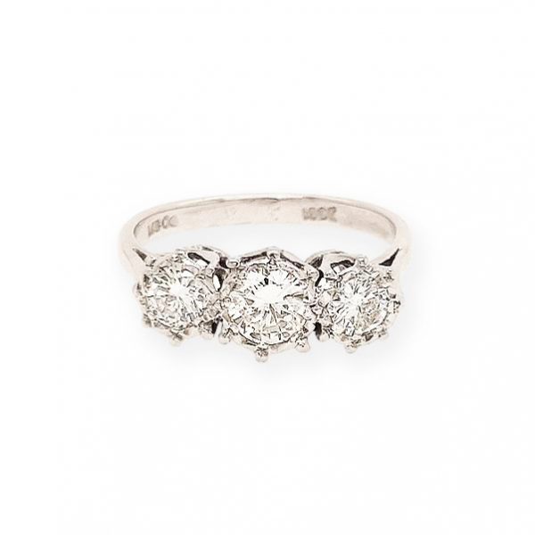 Diamond Three-Stone Ring; A stunning three-stone ring featuring three dazzling round cut diamonds totaling 0.40 carats, claw set into 18ct white gold.