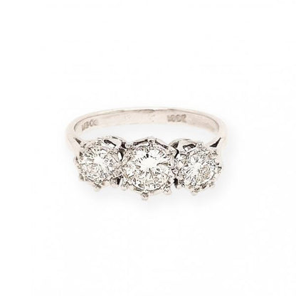 Diamond Three-Stone Ring; A stunning three-stone ring featuring three dazzling round cut diamonds totaling 0.40 carats, claw set into 18ct white gold.
