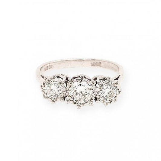 Diamond Three-Stone Ring; A stunning three-stone ring featuring three dazzling round cut diamonds totaling 0.40 carats, claw set into 18ct white gold.