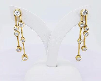 Contemporary Diamond Drop Earrings, 1.40 carat total, colour G, brilliant cut diamonds collet set in 18ct yellow gold, with 18ct gold links