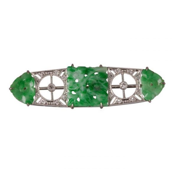 Art Deco Carved Jade, Diamond and Platinum Panel Brooch; with alternating panels of carved jade and diamond set openwork sections