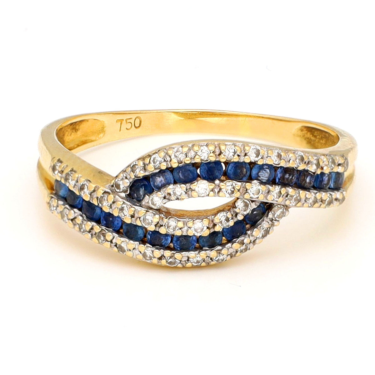 A sapphire and diamond crossover band ring in yellow gold