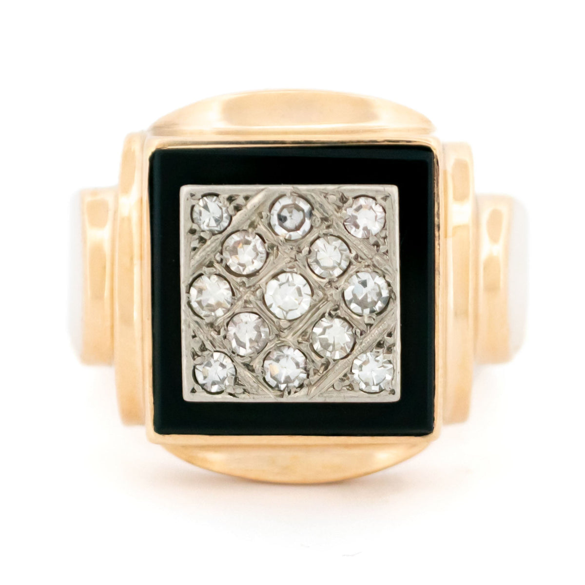 A yellow and white gold signet style ring with a square panel of black onyx and round diamonds