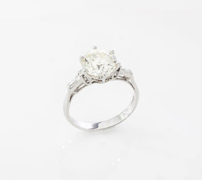 Art Deco Diamond and Platinum Engagement Ring; 3.02ct old European cut diamond with baguette-cut diamond-set shoulders, with GCS certificate