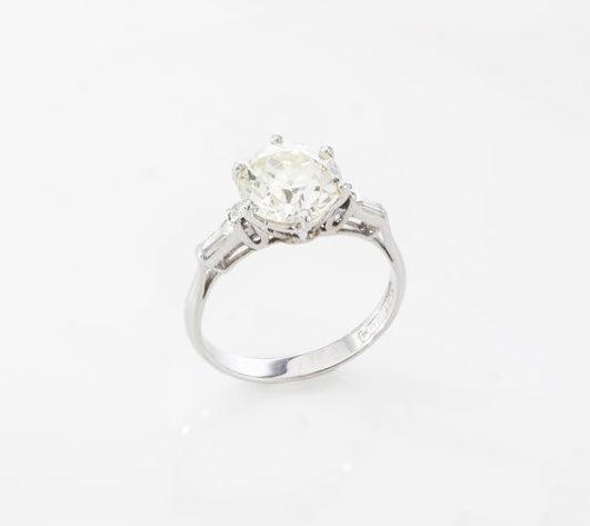 Art Deco Diamond and Platinum Engagement Ring; 3.02ct old European cut diamond with baguette-cut diamond-set shoulders, with GCS certificate