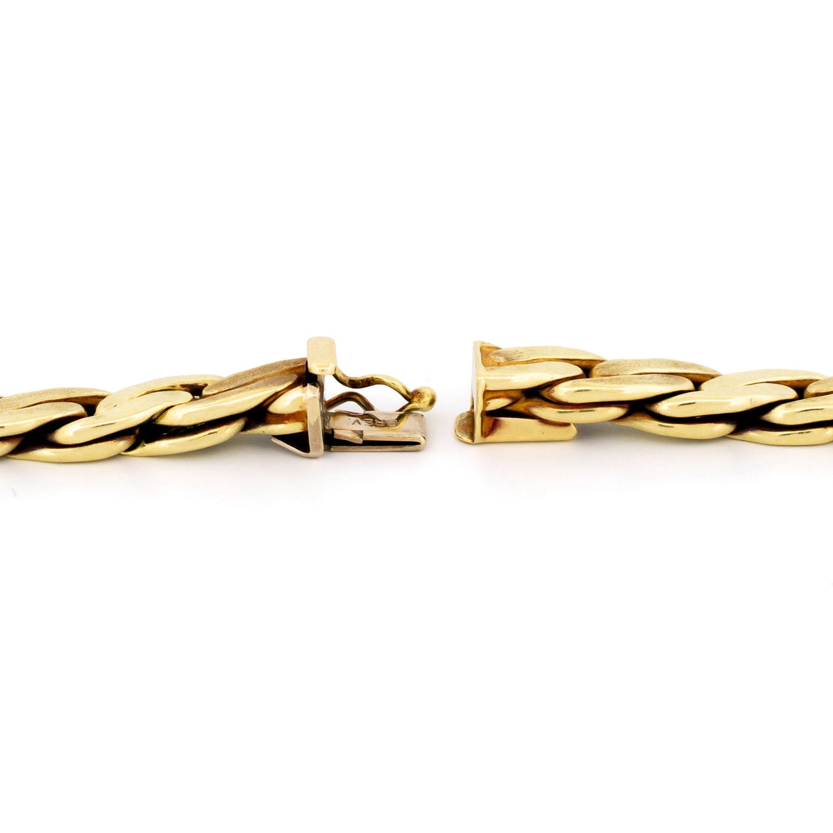 A yellow gold chain necklace, showing the clasp