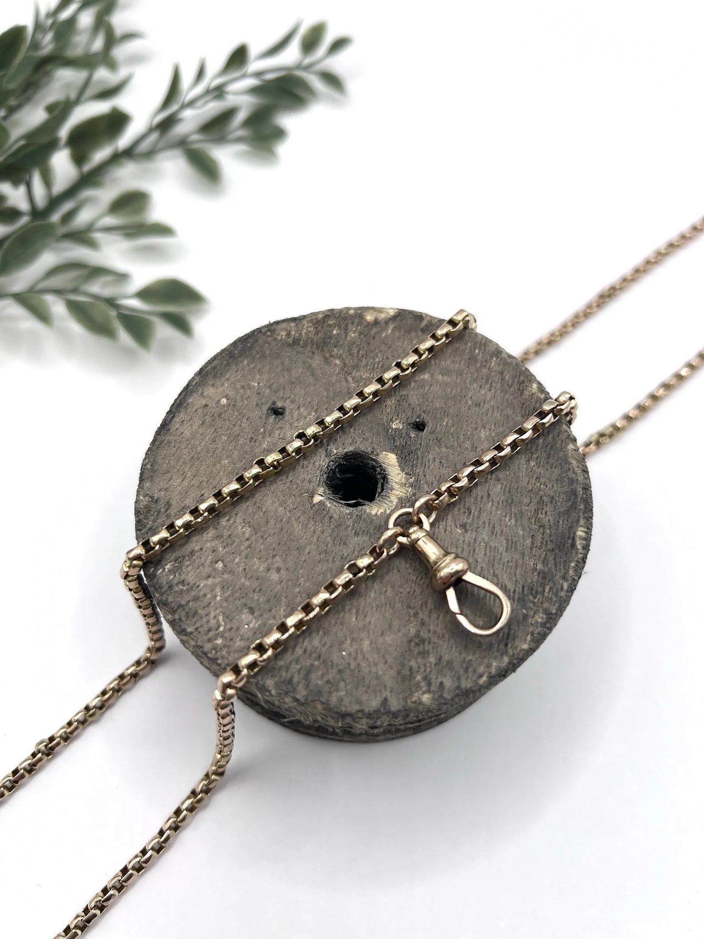 A long rose gold link necklace with swivel clasp