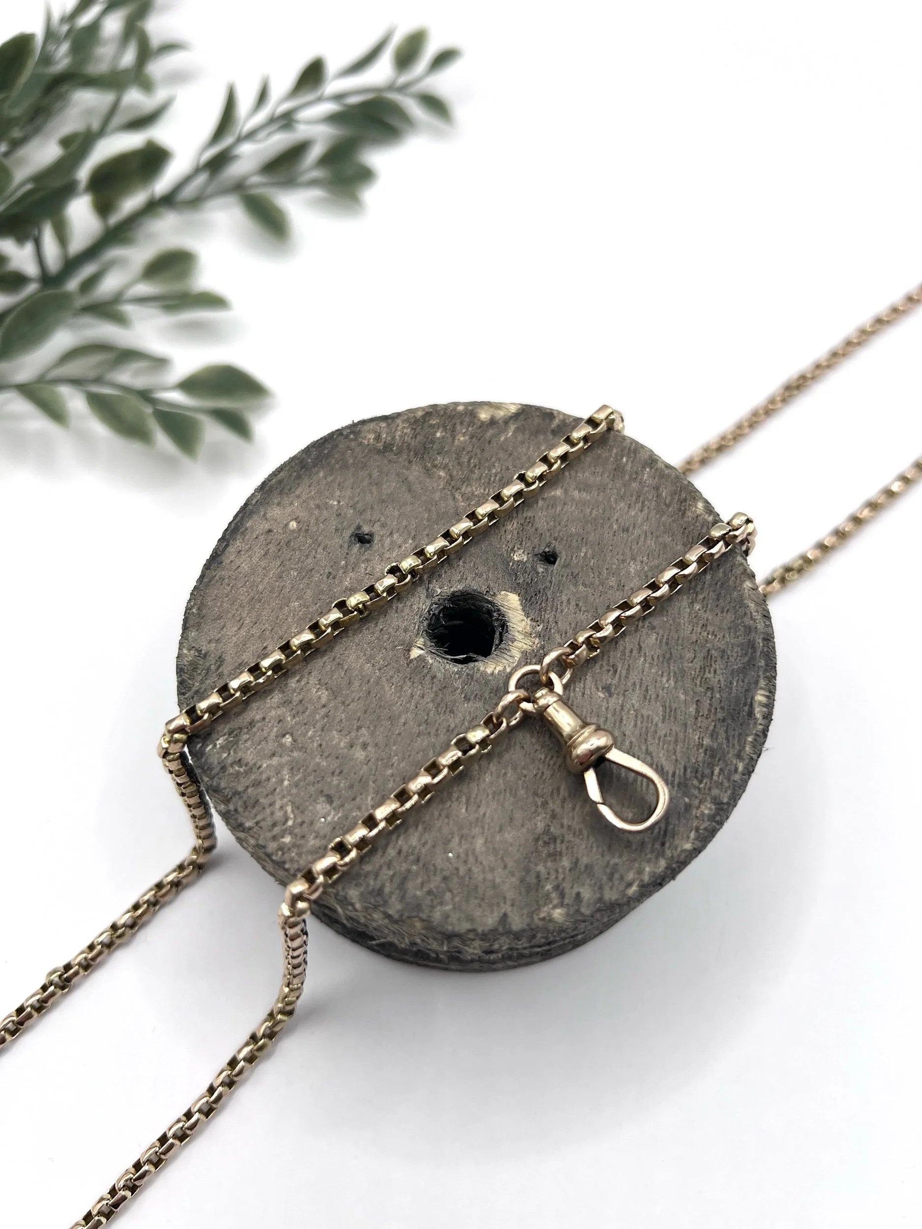 A long rose gold link necklace with swivel clasp