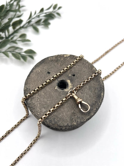 A long rose gold link necklace with swivel clasp