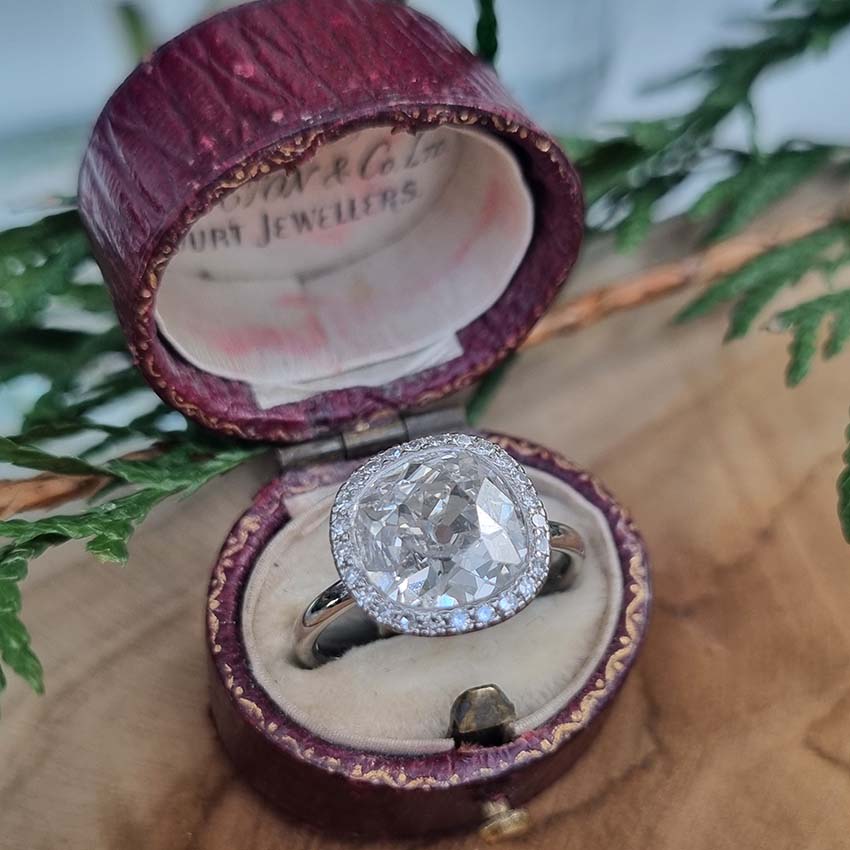 Vintage 3.15ct Cushion Old Cut Diamond Cluster Engagement Ring, 3.15ct cushion-shaped old mine-cut diamond within diamond halo surround in platinum