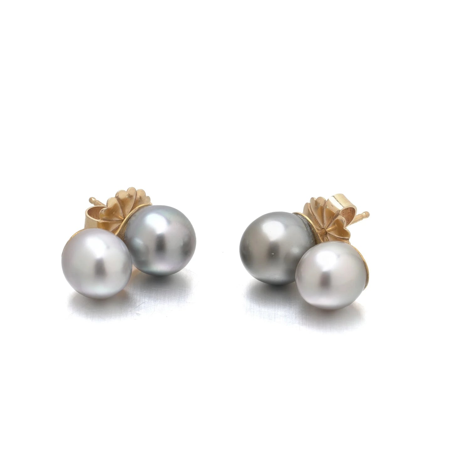 A pair of two stone grey and white pearl drop earrings in yellow gold
