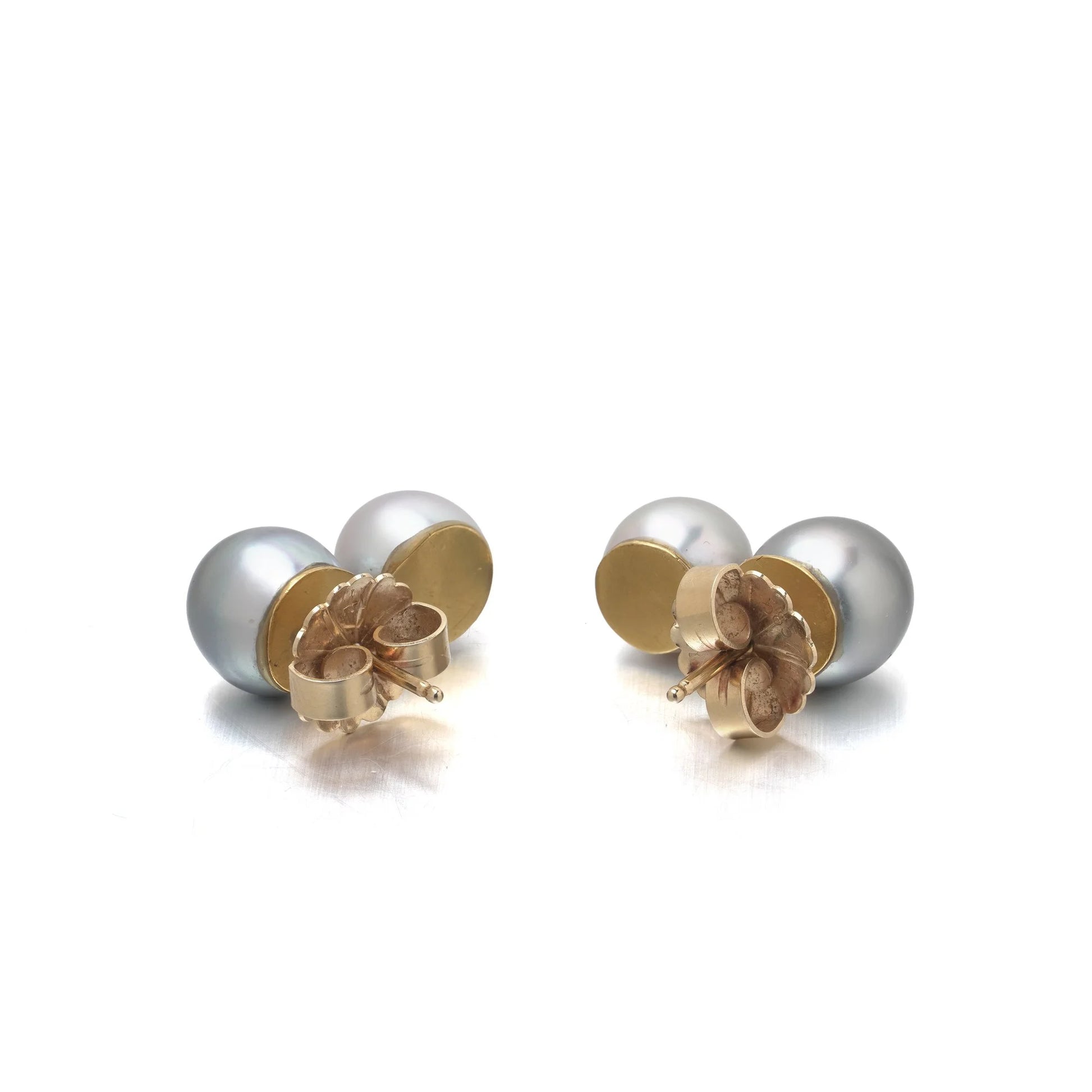 A pair of two stone grey and white pearl drop earrings in yellow gold