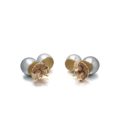 A pair of two stone grey and white pearl drop earrings in yellow gold