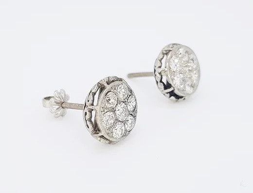 A pair of vintage Diamond Floral Cluster Stud Earrings, 1.80 carat total, mounted in platinum, pierced mount, screw back butterfly fittings