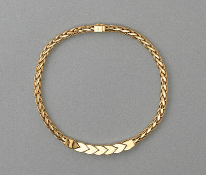 Vintage Steltman 18ct yellow gold rope necklace with six stylised leaves, three of which are set with 1.50cts brilliant cut diamonds, Signed, Circa 1980.