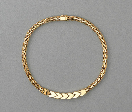 Vintage Steltman 18ct yellow gold rope necklace with six stylised leaves, three of which are set with 1.50cts brilliant cut diamonds, Signed, Circa 1980.