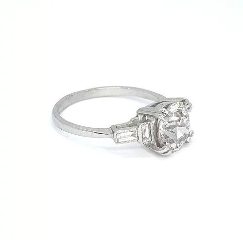 2.16ct Diamond Solitaire Engagement ring, baguette-cut diamond set shoulders, mounted in platinum