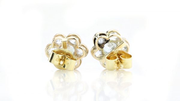 Antique Victorian Old Cut Diamond Floral Cluster Stud Earrings; set with 1.44 carats old cut diamonds arranged in a flower cluster design, in 18ct yellow gold, 19th century, Circa 1860s