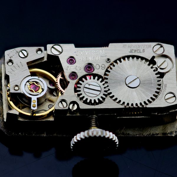 Drecier and Co Art Deco Platinum Manual Watch with Emeralds and Old Cut Diamonds