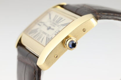 Cartier Tank Divan 18ct Yellow Gold Rectangular Quartz Watch, Large Model Ref. 2602, white dial, Roman numerals, blued steel hands, sapphire crystal, sapphire crown, Cartier brown leather strap with 18ct yellow gold pin buckle.