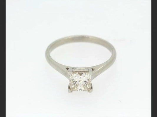 Princess Cut Solitaire Diamond Ring; a single square cut / princess cut diamond weighing 1.01 carats, set in Platinum. A classic and timeless ring.