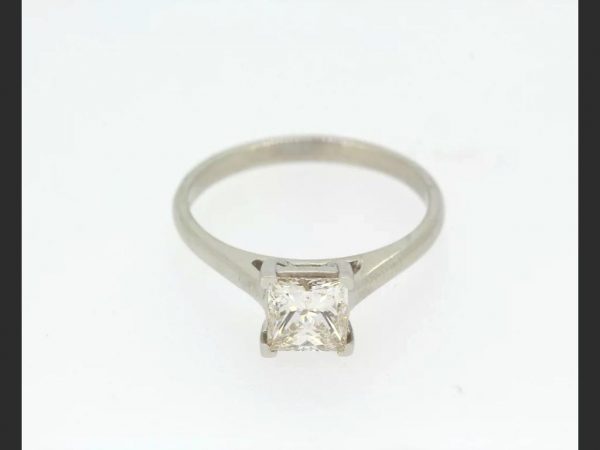 Princess Cut Solitaire Diamond Ring; a single square cut / princess cut diamond weighing 1.01 carats, set in Platinum. A classic and timeless ring.