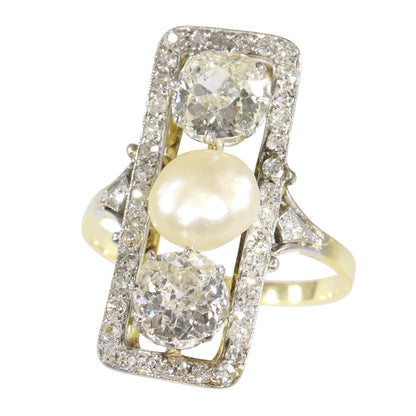 A diamond and pearl elongated plaque ring in yellow gold and platinum