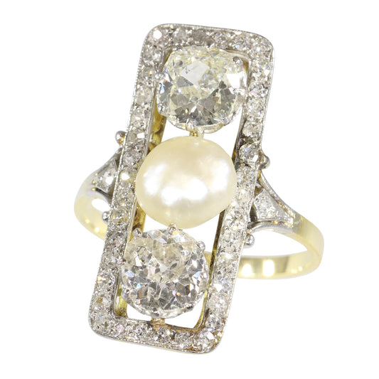 A diamond and pearl elongated plaque ring in yellow gold and platinum