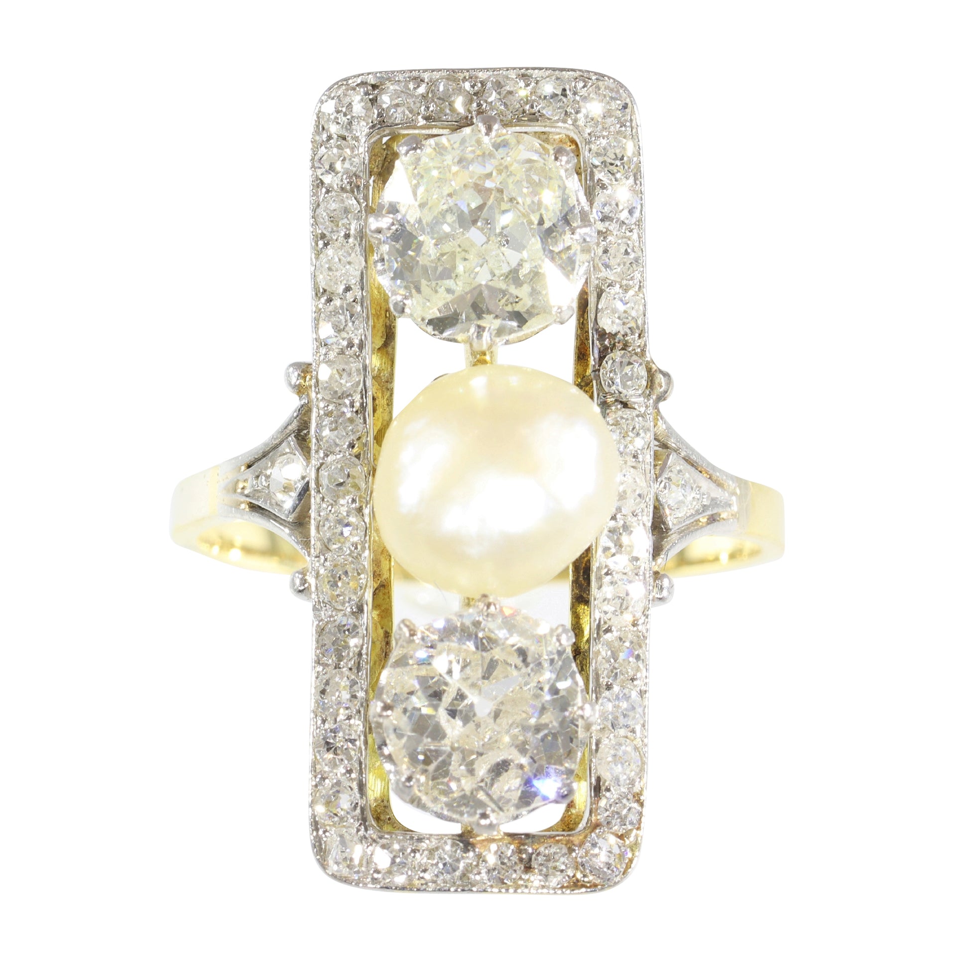 A diamond and pearl elongated plaque ring in yellow gold and platinum