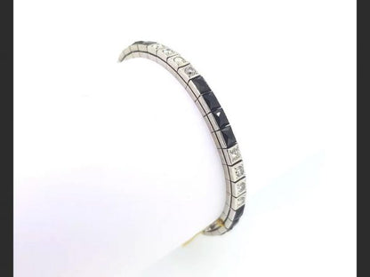 Onyx and diamond line bracelet, circa 1930, diamonds totaling 2.00 carats, 14ct white gold