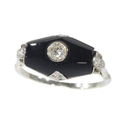 Art Deco diamond and onyx ring in white gold.