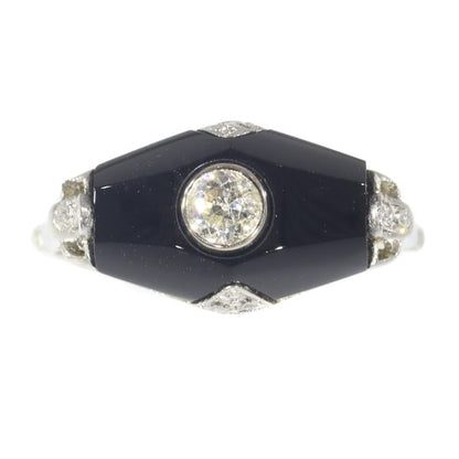 Art Deco diamond and onyx ring in white gold.