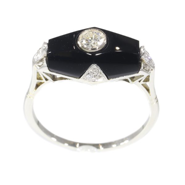 Art Deco diamond and onyx ring in white gold.