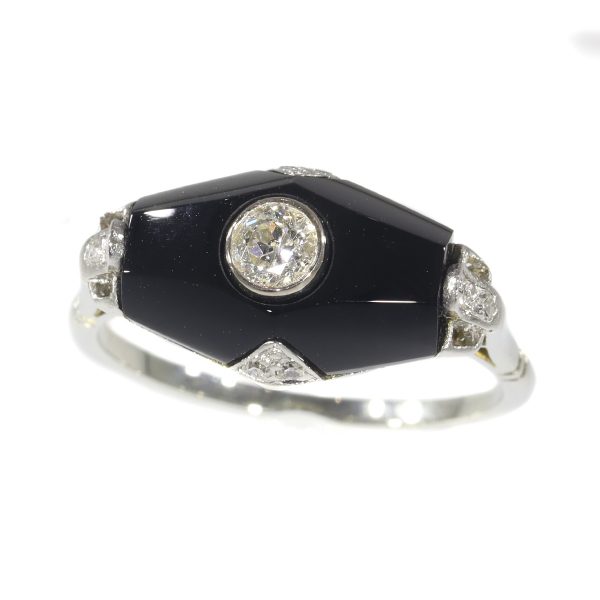 Art Deco diamond and onyx ring in white gold.