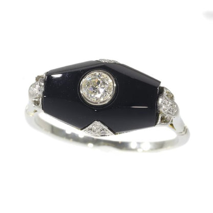 Art Deco diamond and onyx ring in white gold.