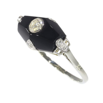 Art Deco diamond and onyx ring in white gold.