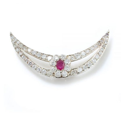 Antique Edwardian Ruby and Old Cut Diamond Cluster Crescent Brooch; oval Burma ruby and old-cut diamond cluster on diamond-set split crescent