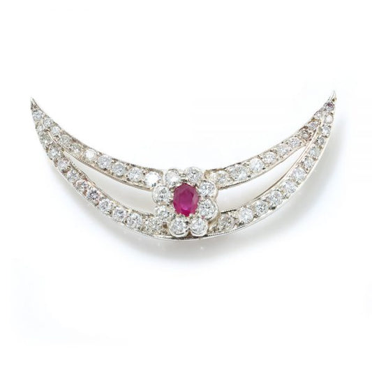 Antique Edwardian Ruby and Old Cut Diamond Cluster Crescent Brooch; oval Burma ruby and old-cut diamond cluster on diamond-set split crescent