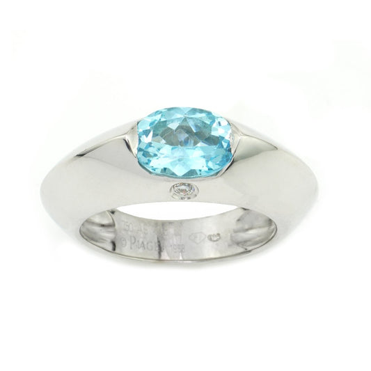 Vintage Piaget Blue Topaz and 18ct White Gold Ring; 1ct oval blue topaz accented with a small diamond on the side, in original Piaget box. Made in Switzerland Circa 1998